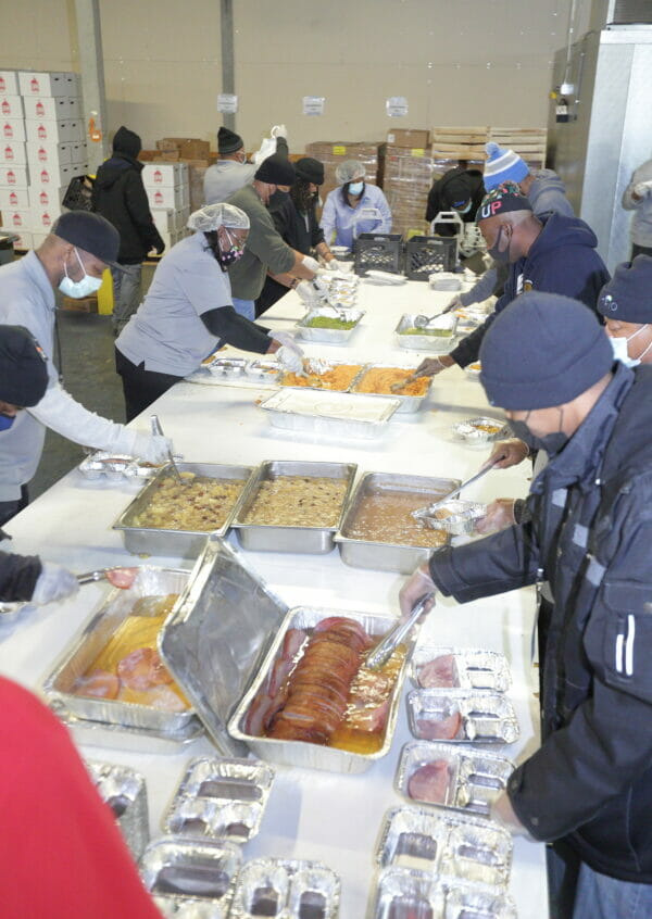 Volunteers preparing food